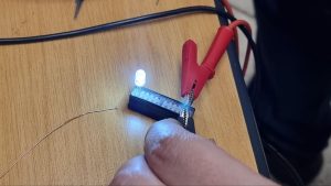 Testing the tiny bread board with an led